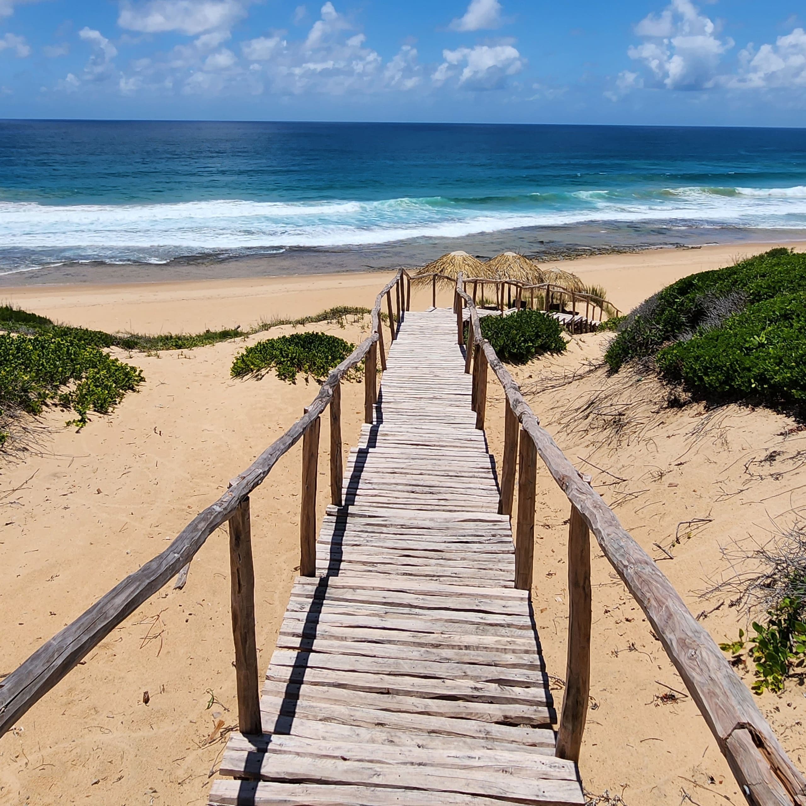 The boardwalk to Tofo beach at Cabana Beach Resort
